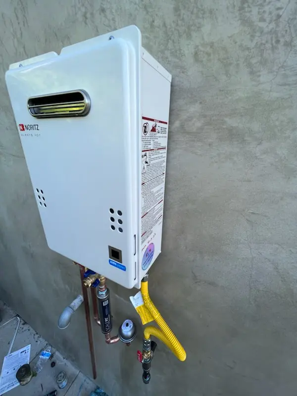 Tankless water heater installation for The Village homes